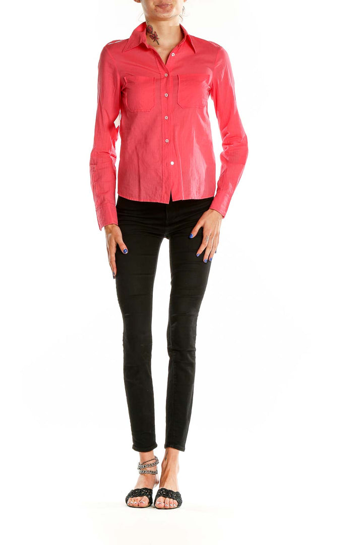 Front view of coral Tory Burch long sleeve button-up shirt