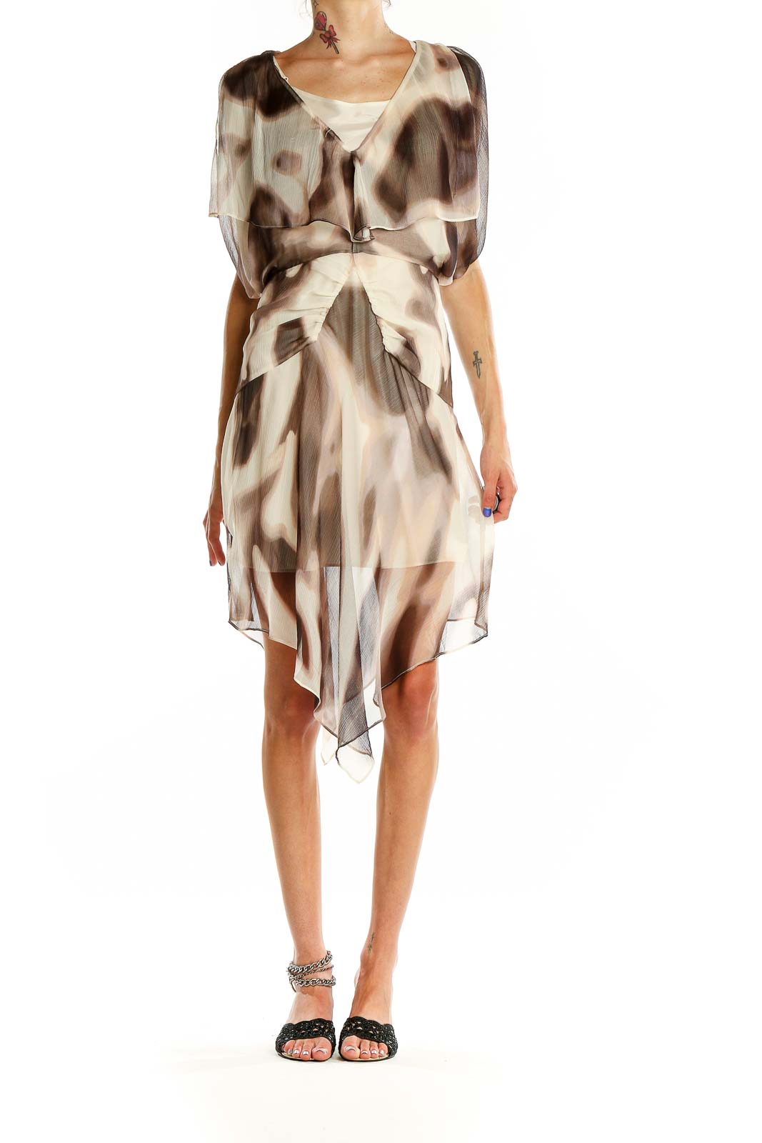 Front view of Moda International beige abstract print flowy dress with layered design