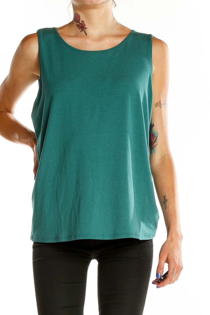 Front view of Eileen Fisher green sleeveless tank top with scoop neck