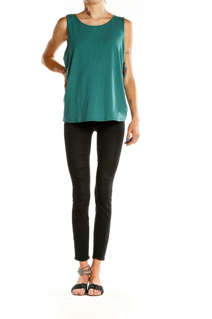 Front view of Eileen Fisher green sleeveless tank top with scoop neck