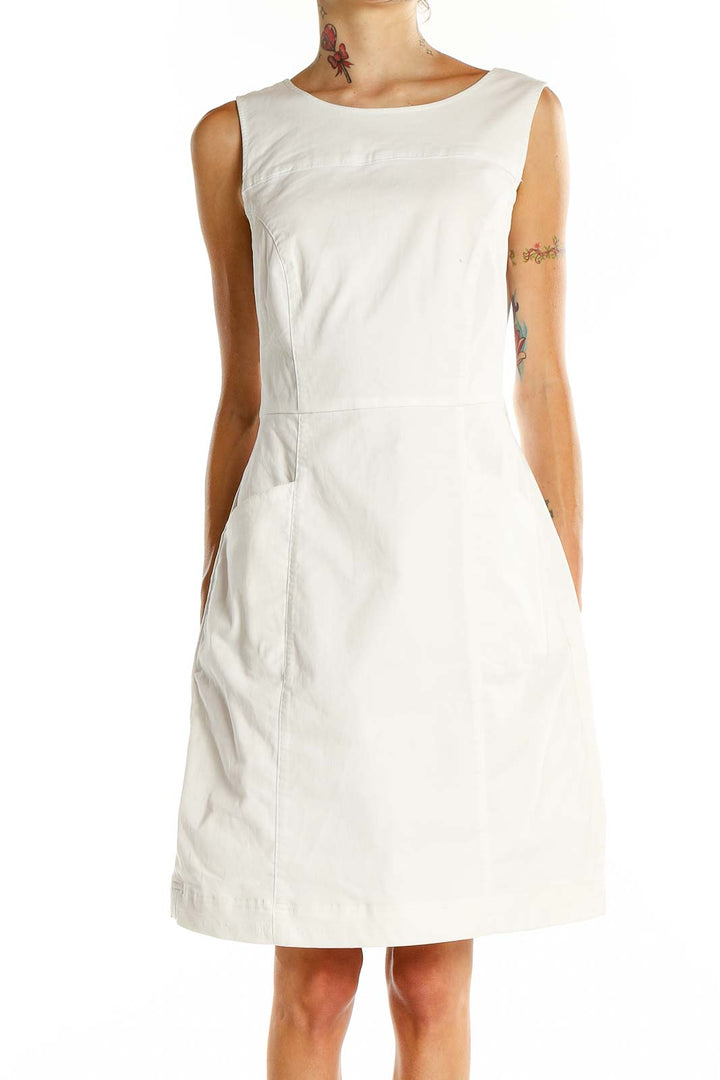 Front view of white sleeveless A-line dress from Boden