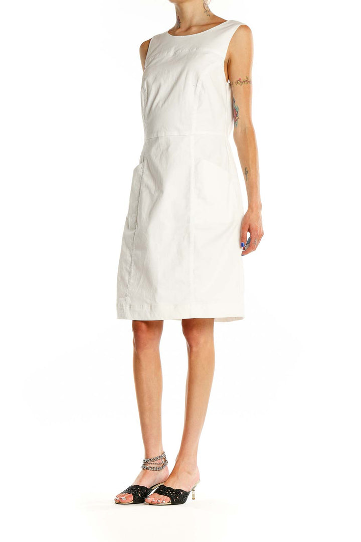 Front view of white sleeveless A-line dress from Boden