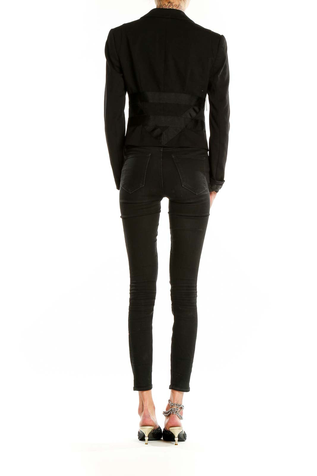 Back view of Bebe black cropped blazer showing tailored fit