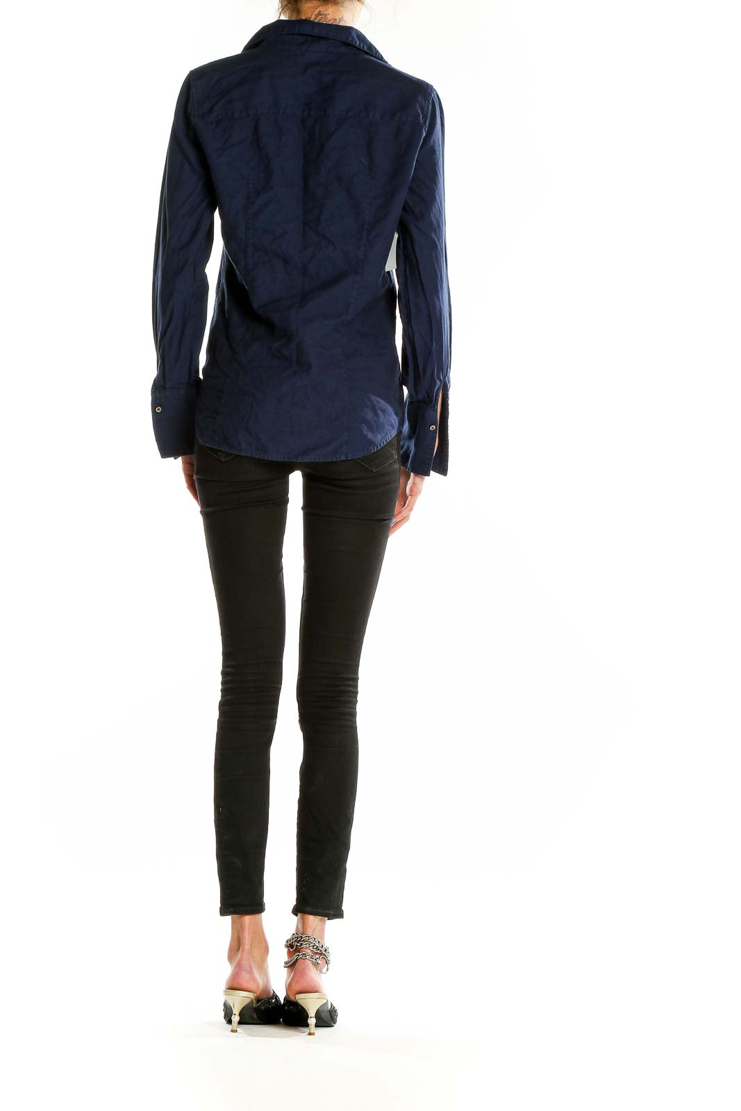 Back view of J.Crew navy cotton button-down shirt on model with black pants