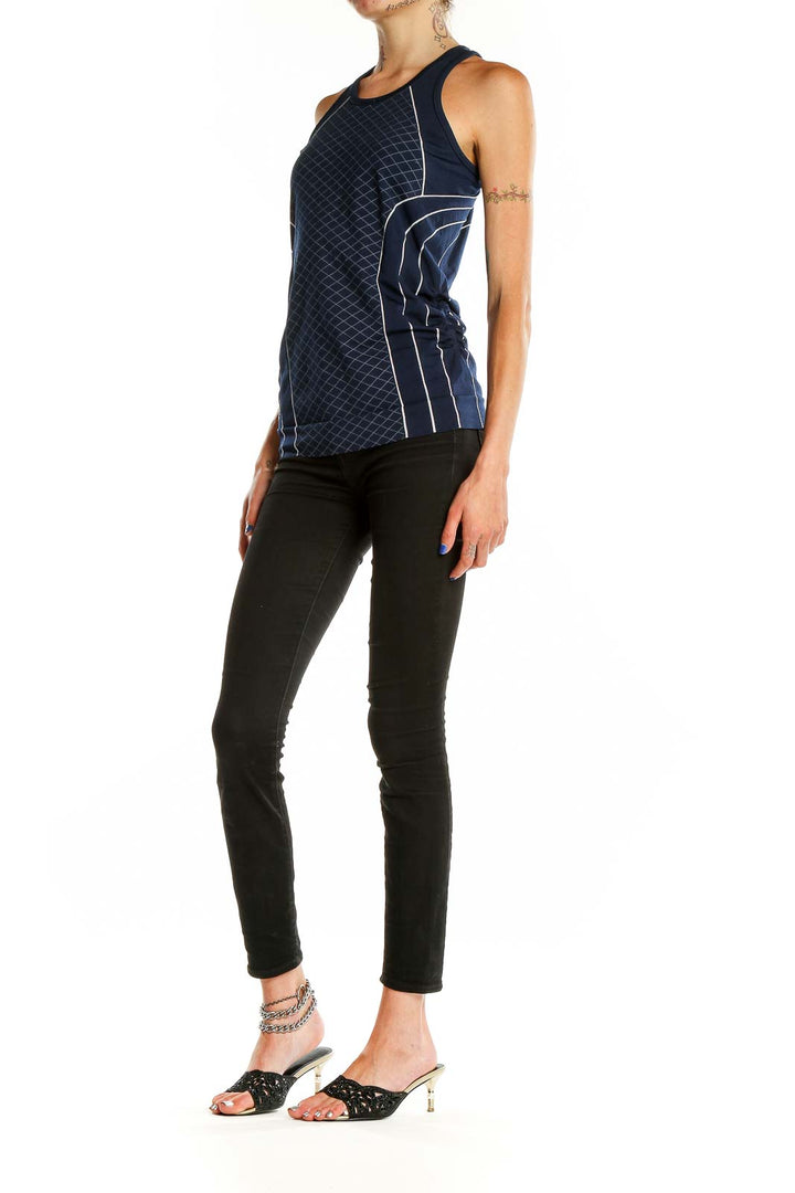 Front view of navy Athleta performance tank top with diamond pattern