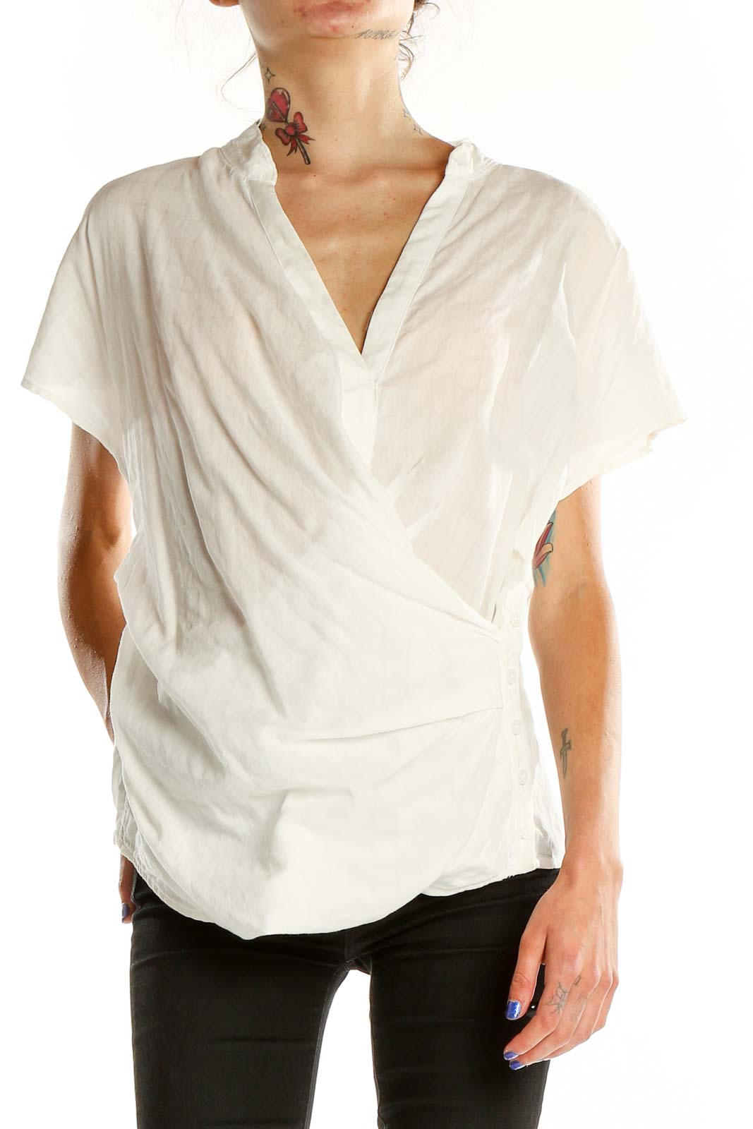 Front view of Akemi + Kin white wrap-style short sleeve blouse