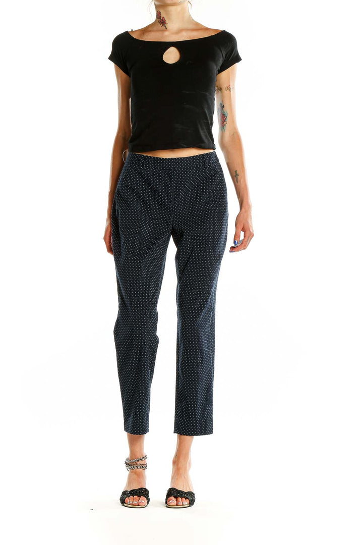 Front view of Chelsea28 navy polka dot cropped trousers on model