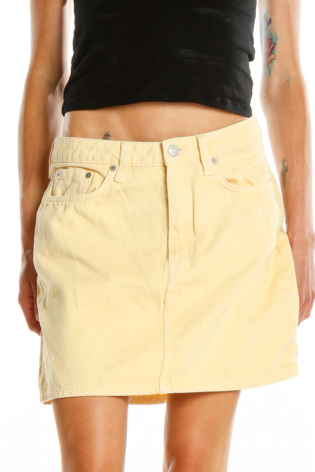 Front view of yellow denim mini skirt by Weekday