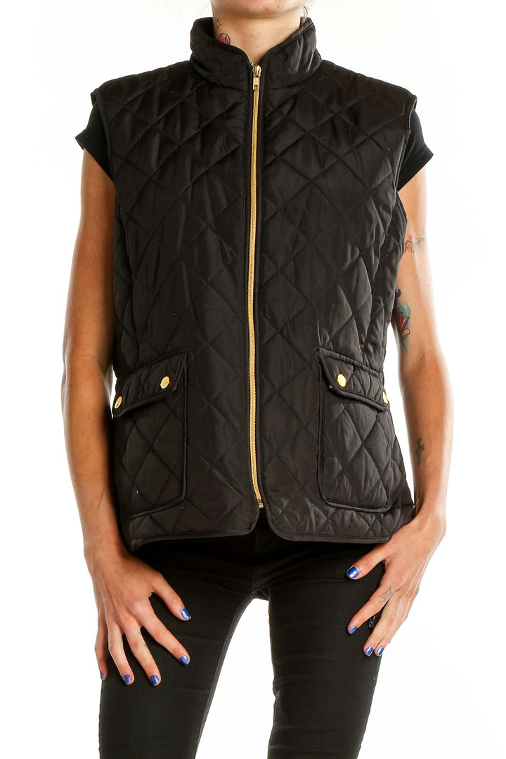 Front view of St. John's Bay black quilted vest with gold-tone zipper