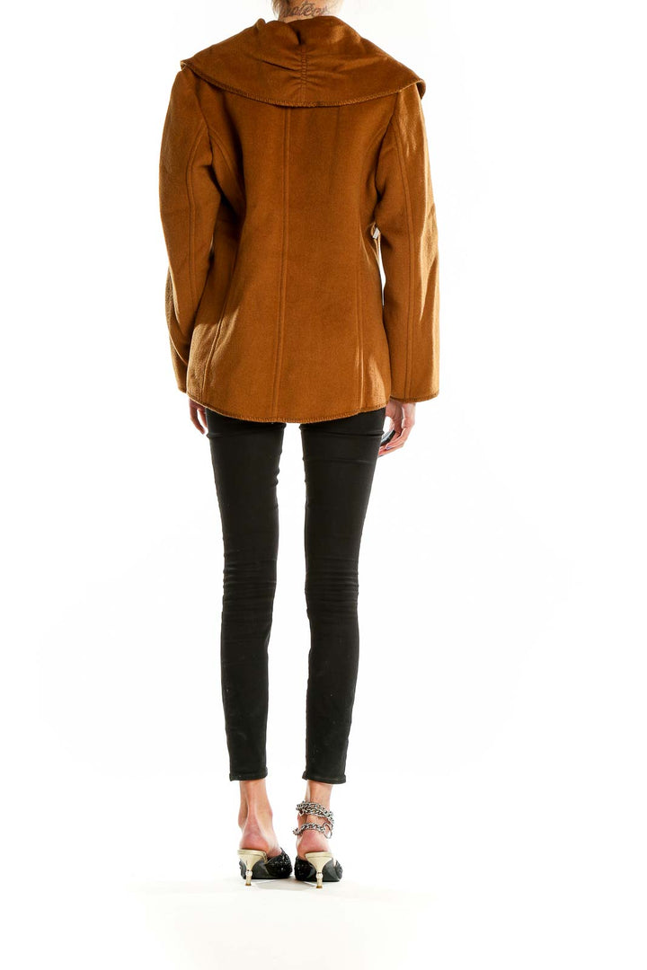 Back view of camel J.Jill coat showing tailored fit and length