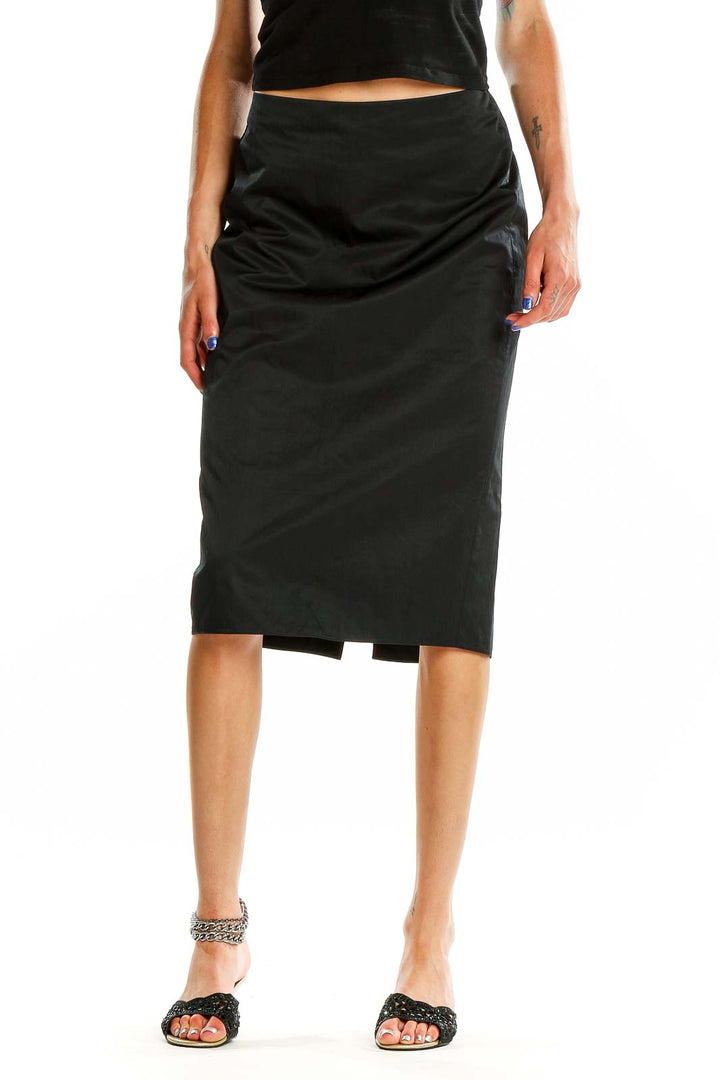 Front view of Calvin Klein black pencil midi skirt on model