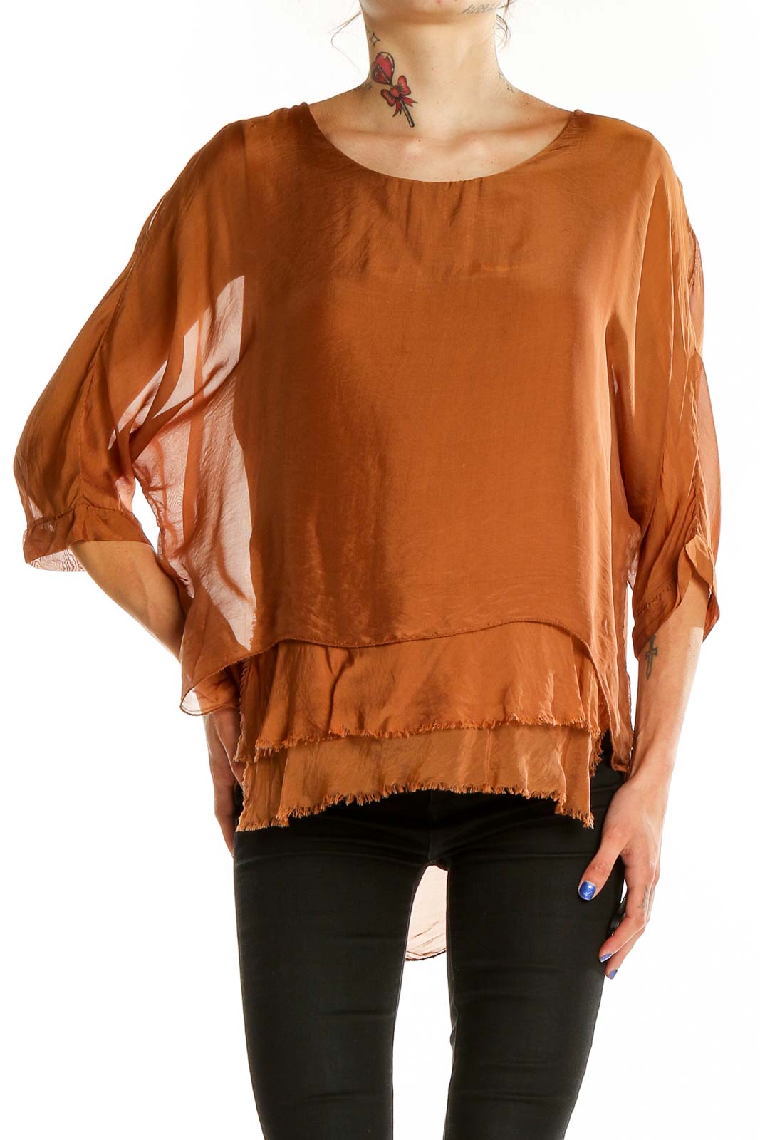 Front view of Gigi moda rust flowy layered blouse with billowing sleeves