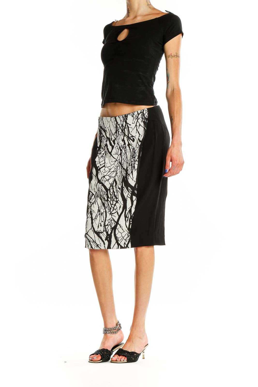 Front view of Rachel Roy black and white patterned pencil skirt