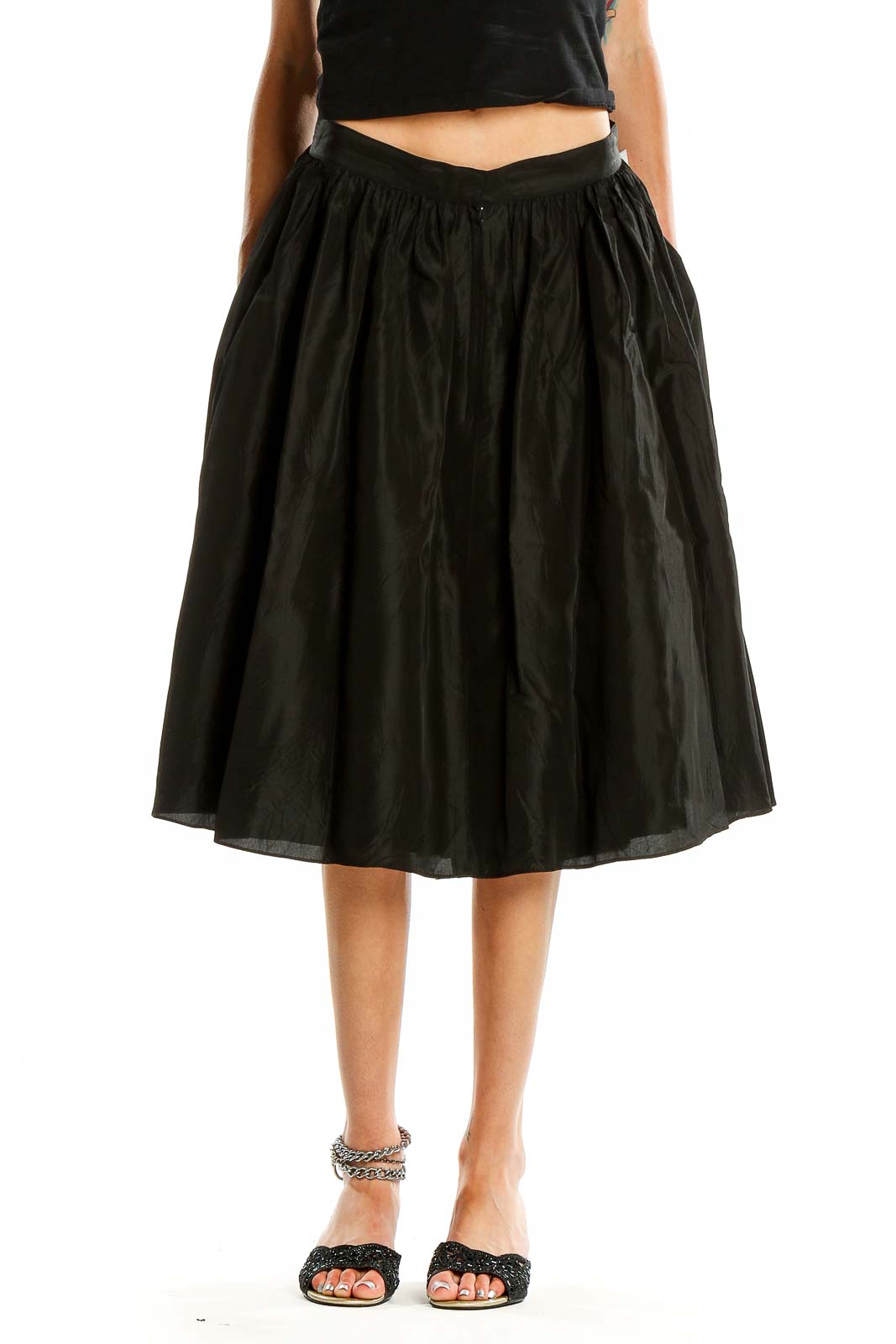 Front view of SilkRoll black flared midi skirt on model