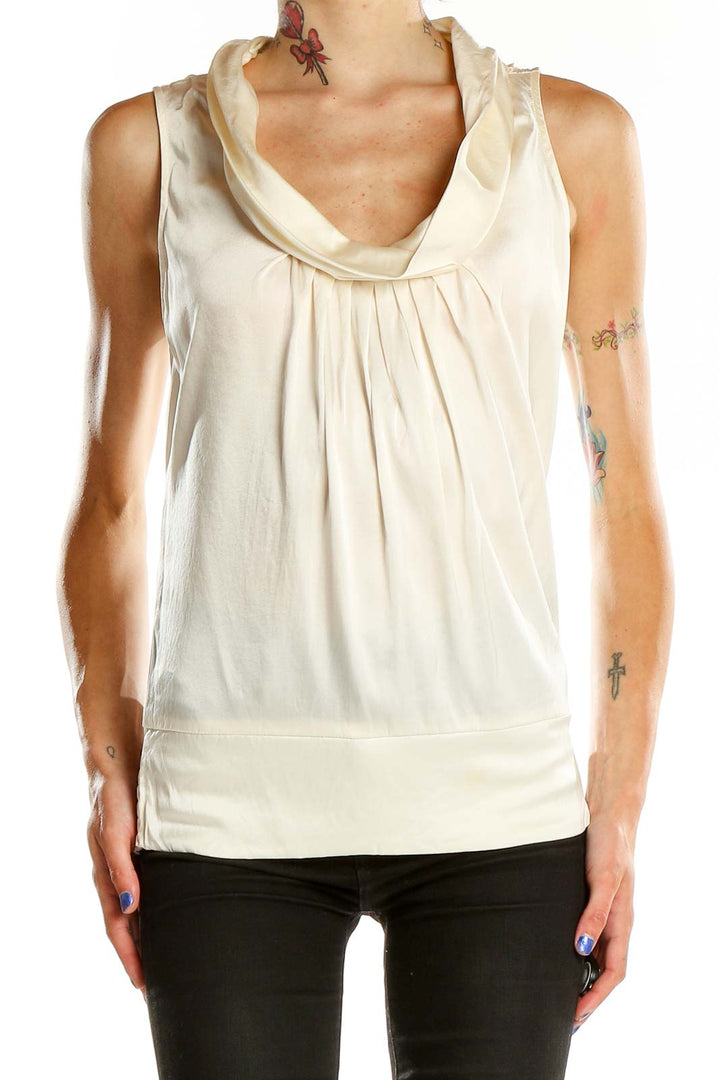 Front view of Cache cream sleeveless cowl neck top on model