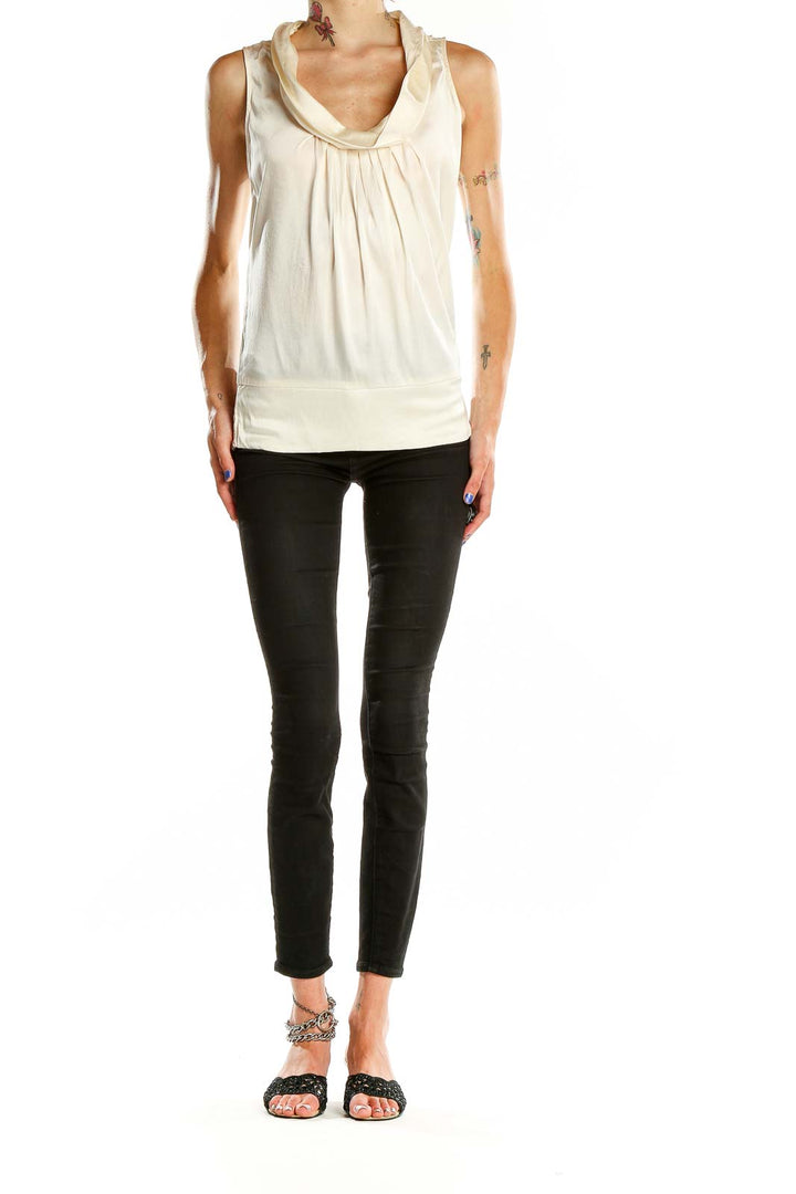 Front view of Cache cream sleeveless cowl neck top on model