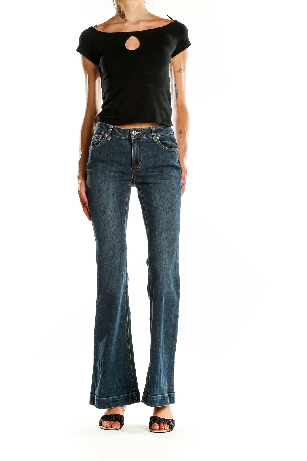 Front view of Cache blue flared denim jeans on model