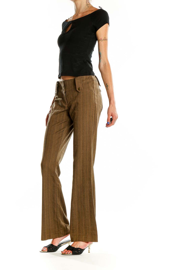 Front view of Cache brown pinstriped wide-leg trousers on model