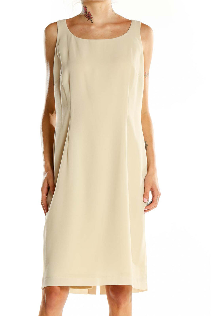 Front view of Jessica Howard beige sleeveless sheath dress