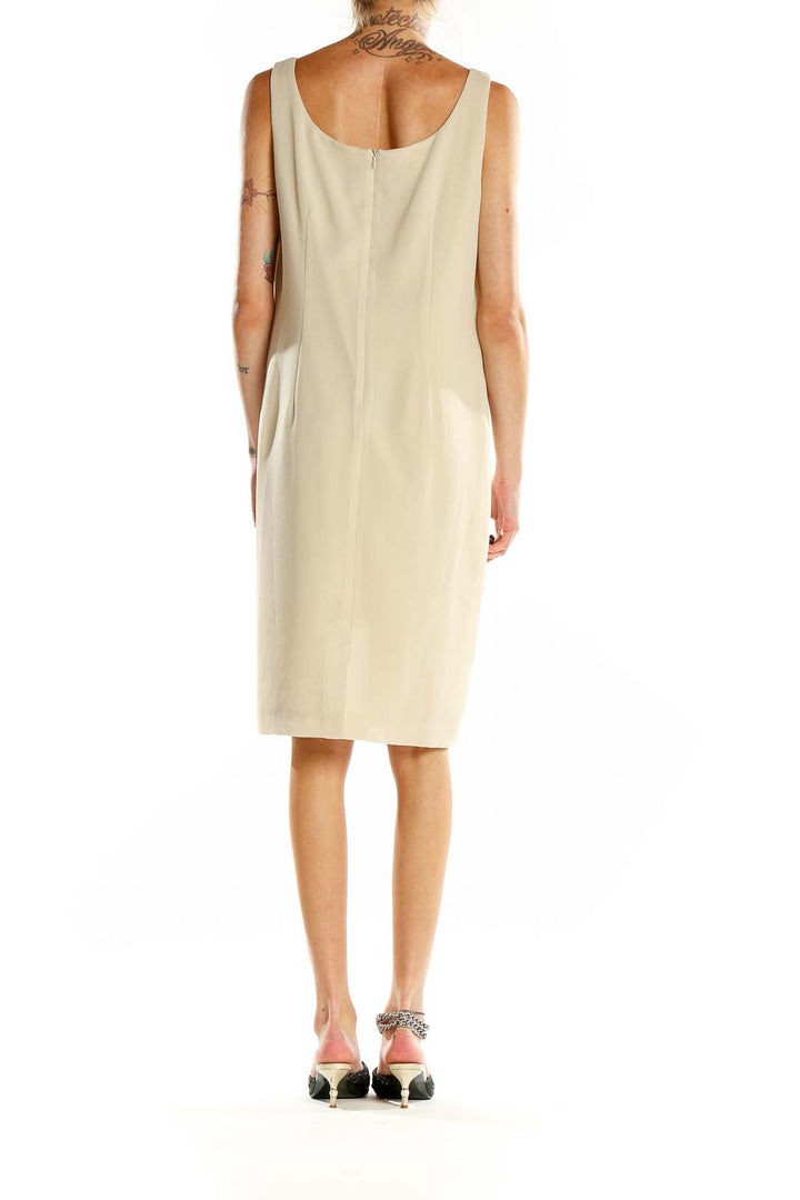 Back view of Jessica Howard beige sleeveless sheath dress