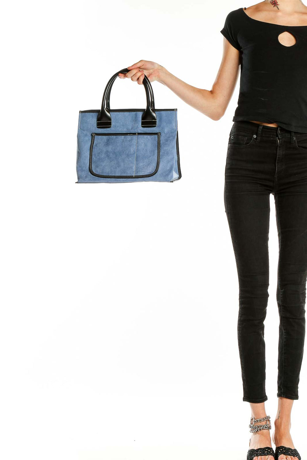 Front view of blue suede satchel with black leather handles by Signature Sax Fifth Avenue