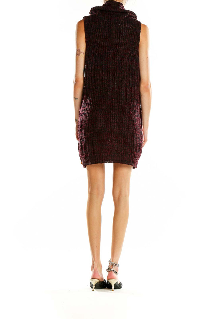 Back view of burgundy chunky knit sleeveless turtleneck dress showing full length