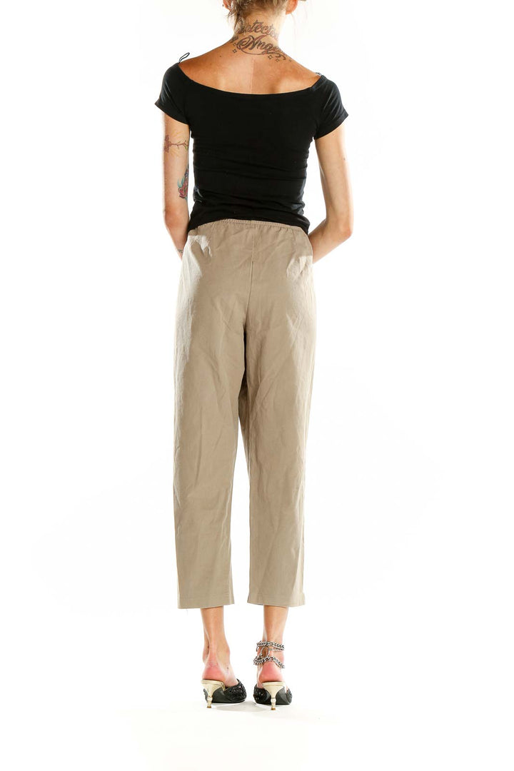 Back view of Eileen Fisher beige cropped pants on model