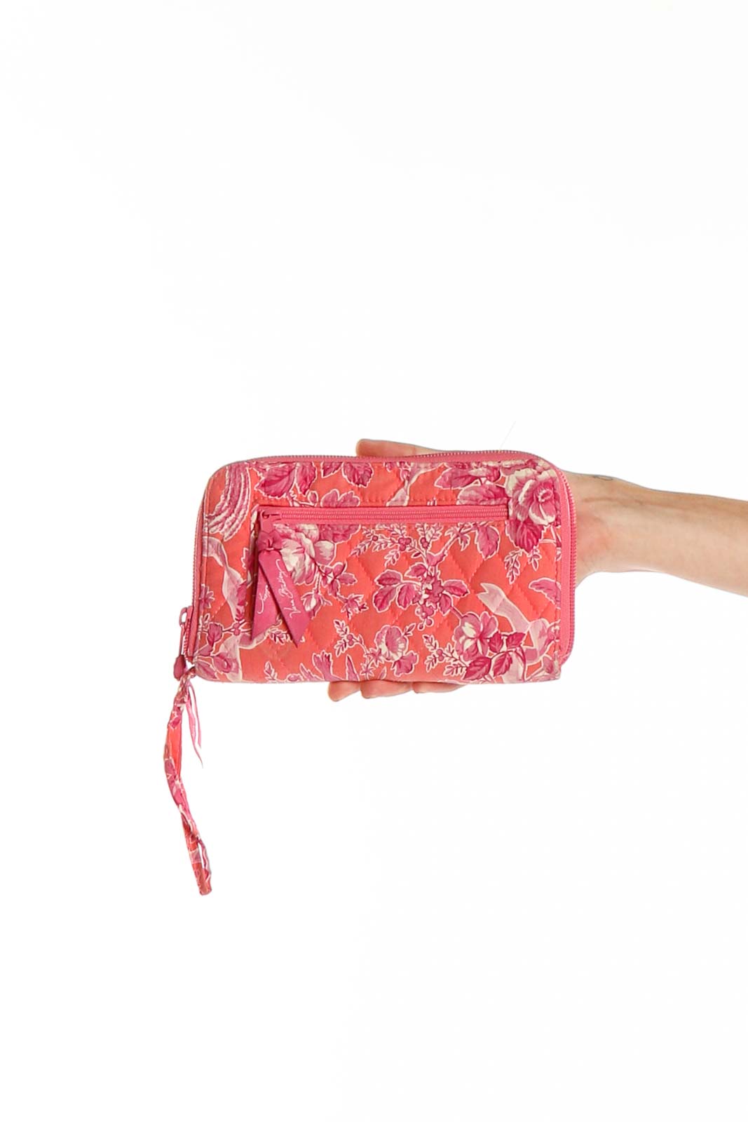 Front view of pink floral patterned Vera Bradley clutch with zippered compartment