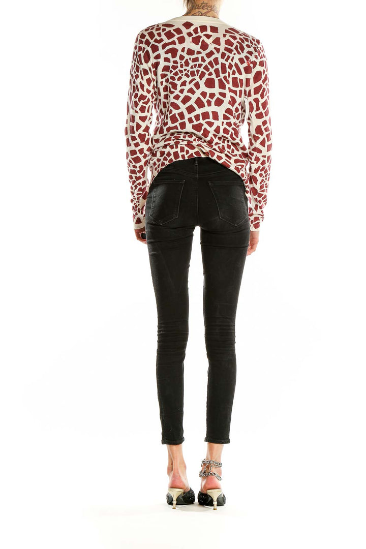 Back view of VOLCOM Red and White Giraffe Print Cardigan