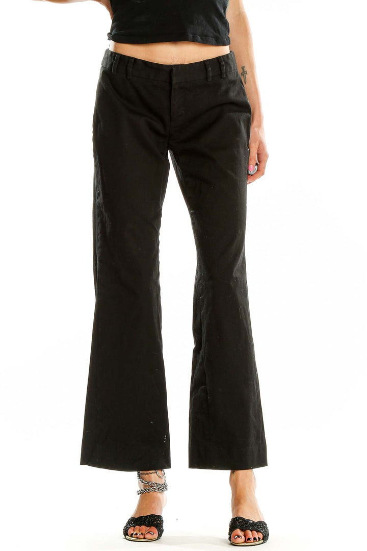 Front view of black wide-leg trousers by LAUNDRY by SHELLI SEGAL