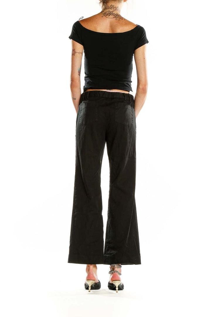 Back view of black wide-leg trousers by LAUNDRY by SHELLI SEGAL