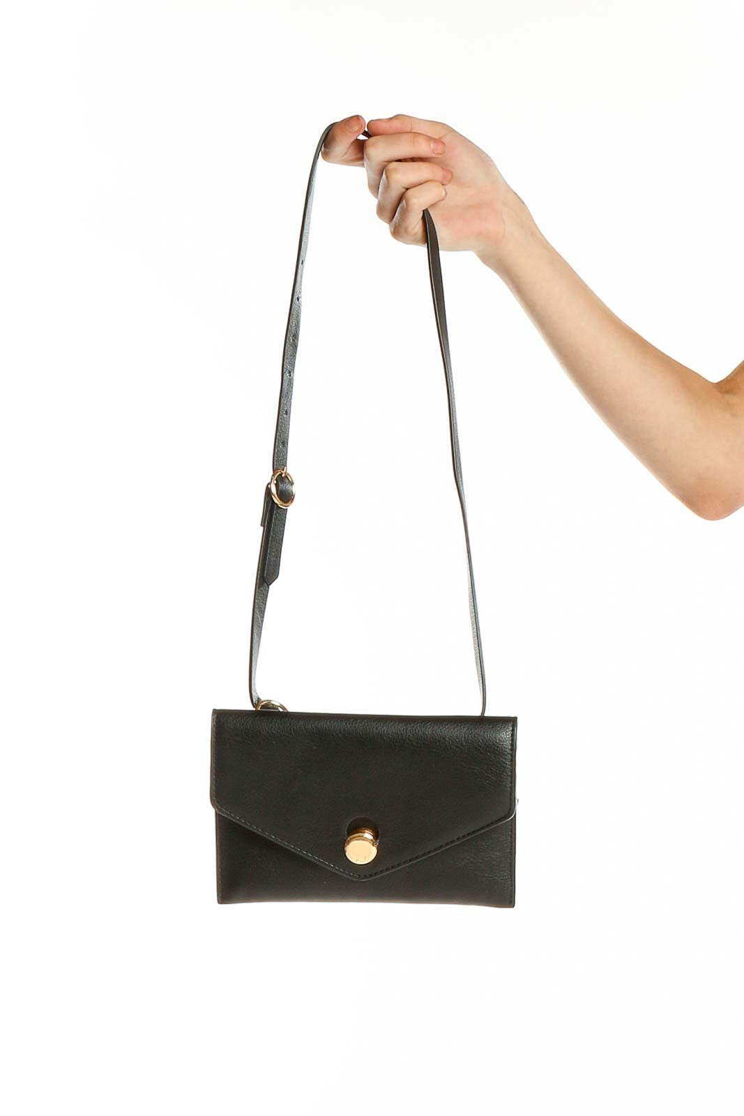 Front view of black Zara envelope crossbody bag with gold-tone button