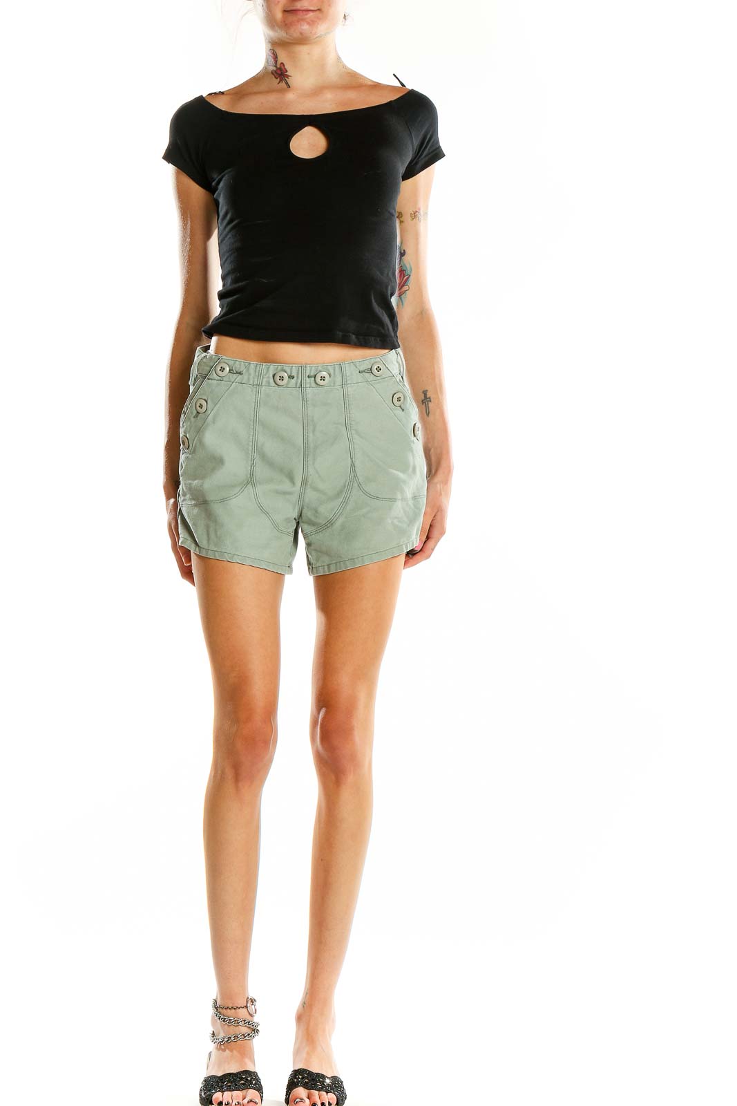 Front view of sage green Obey shorts with button-detail waistband