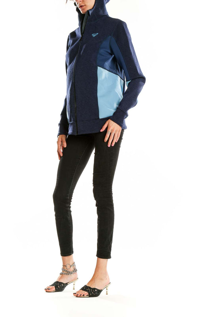 Front view of Roxy navy blue zip-up athletic jacket with light blue side panels