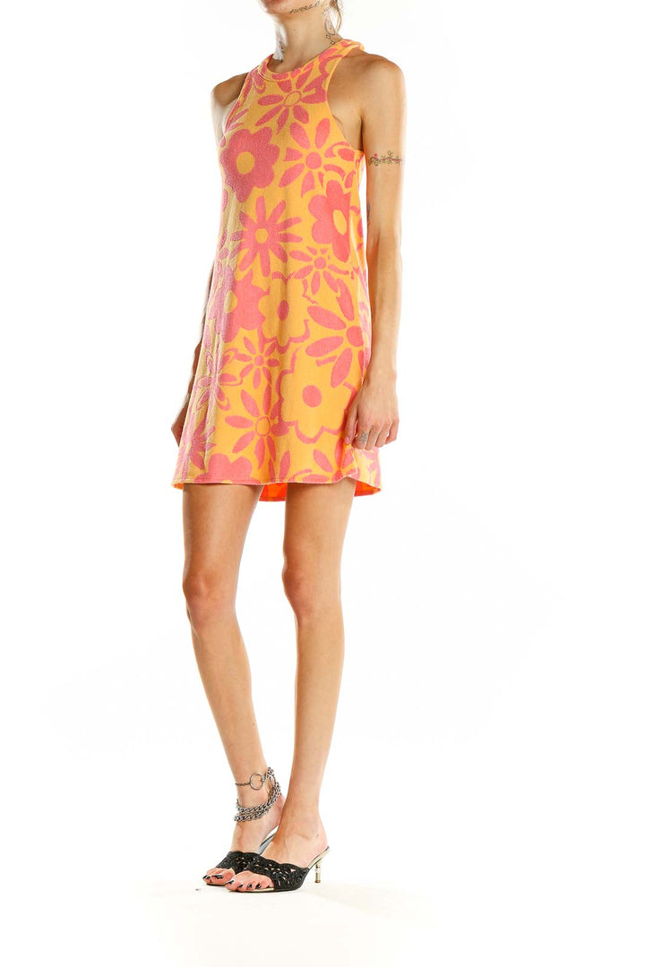 Front view of orange Zara mini dress with pink floral prints