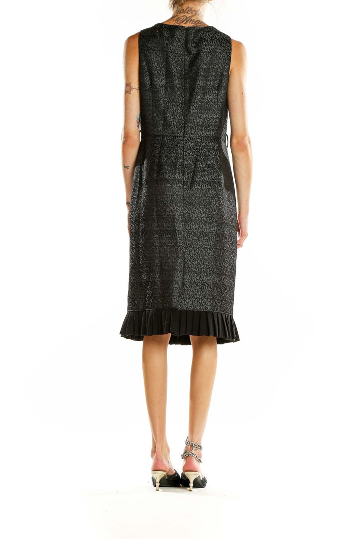 Back view of Kasper black textured sleeveless midi dress with pleated hem