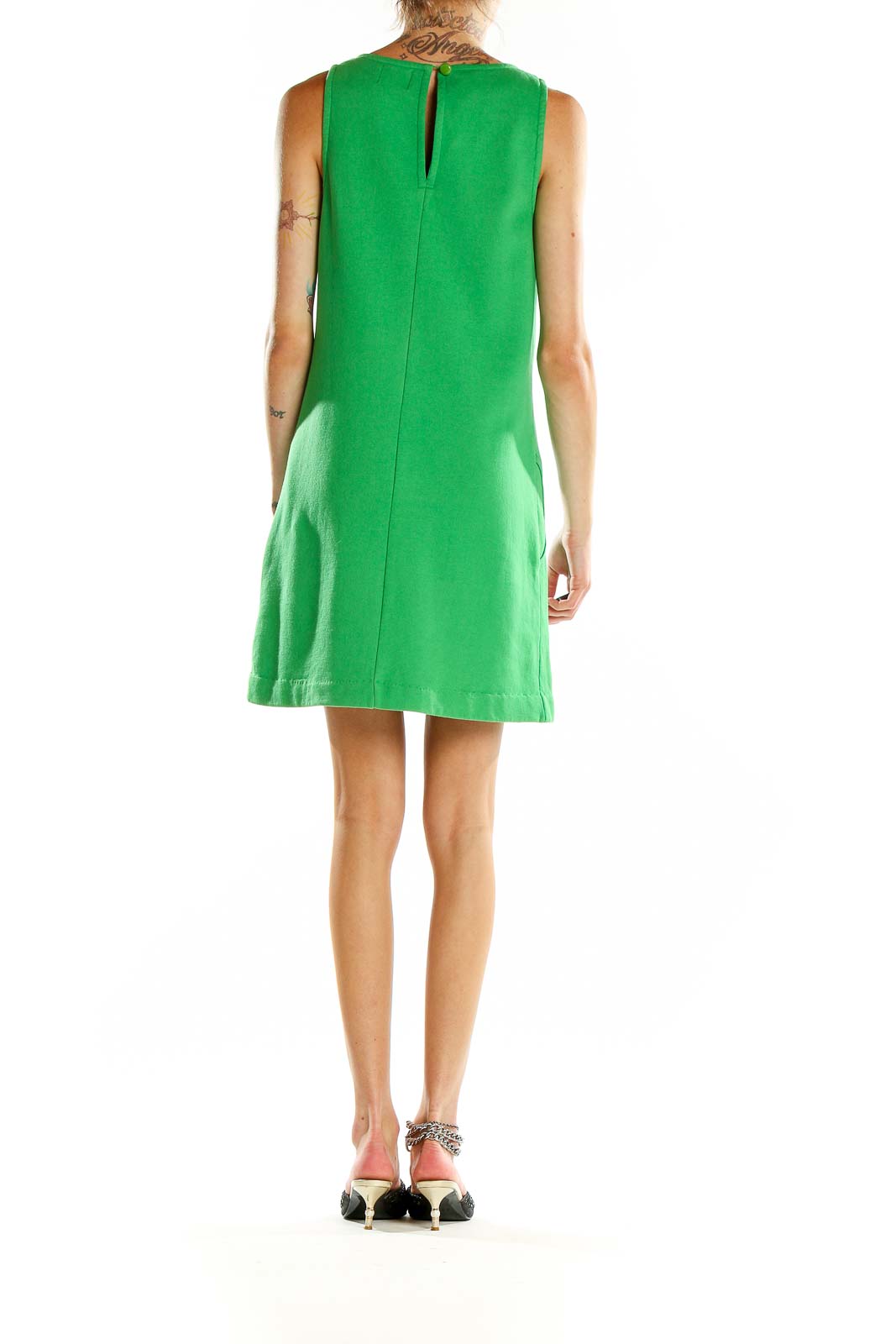 Back view of green Juicy Couture mini dress showing keyhole detail