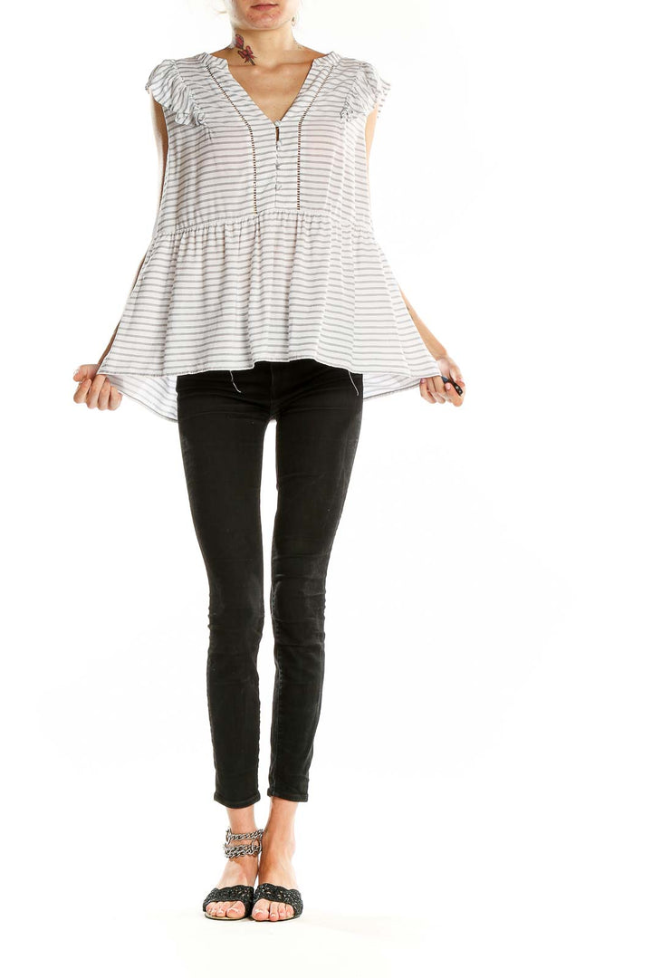 Front view of LOFT white striped peplum top with ruffled sleeves