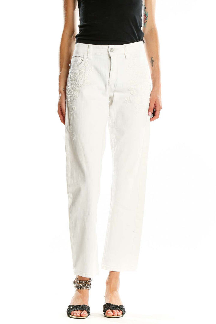 Front view of Pilcro and the Letterpress white embroidered straight leg jeans