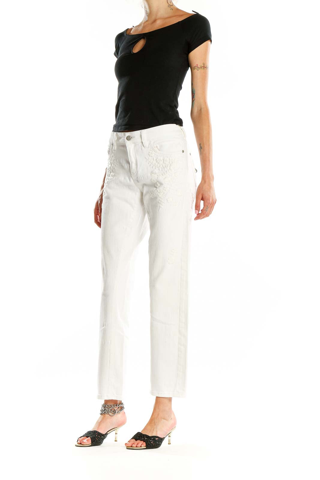 Front view of Pilcro and the Letterpress white embroidered straight leg jeans