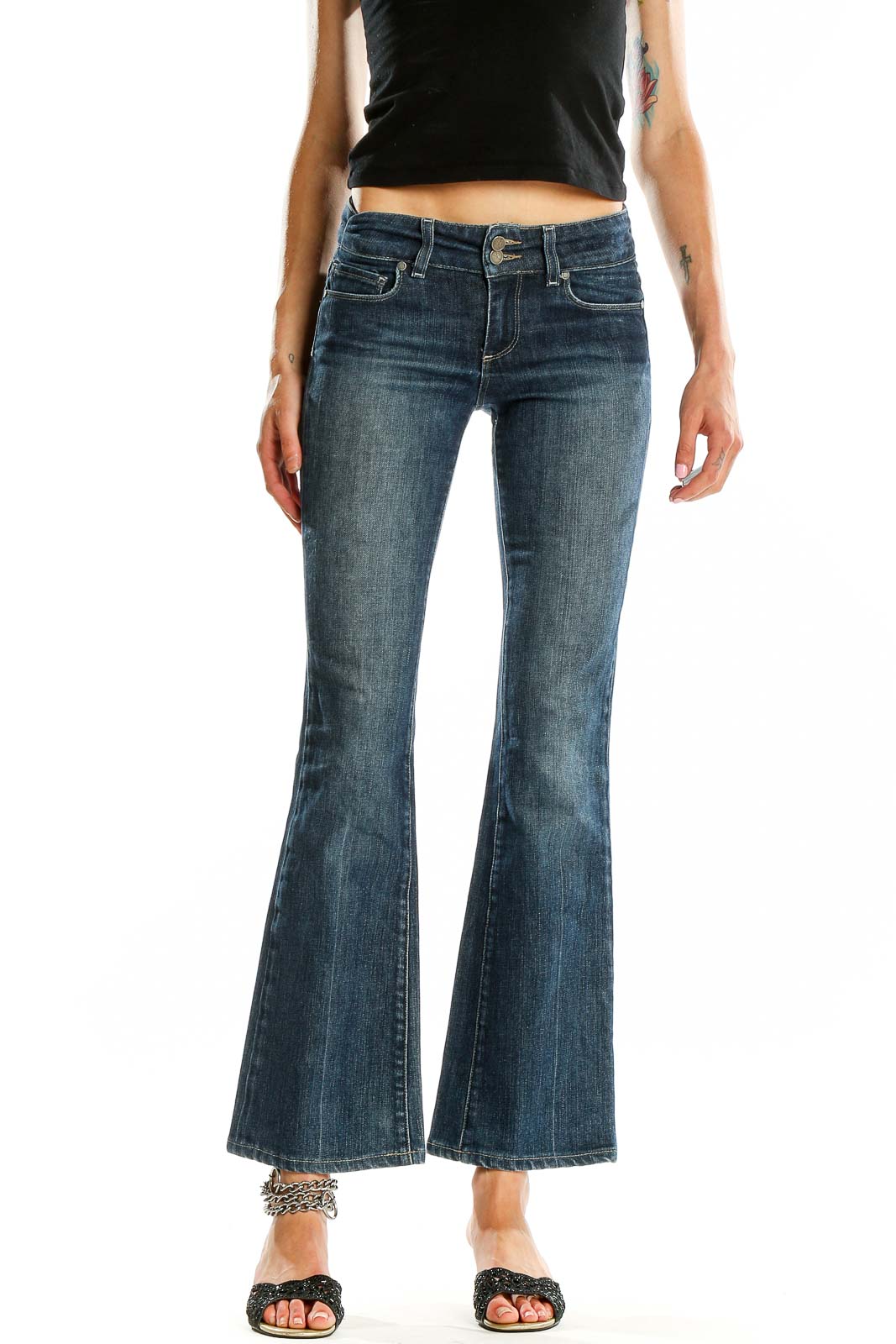 Front view of Paige blue flared denim jeans on model