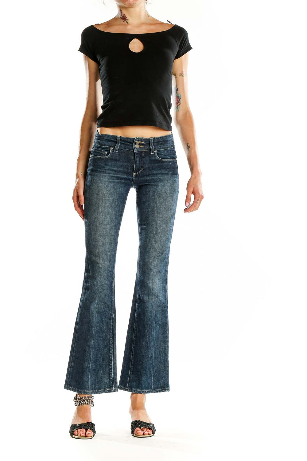 Front view of Paige blue flared denim jeans on model