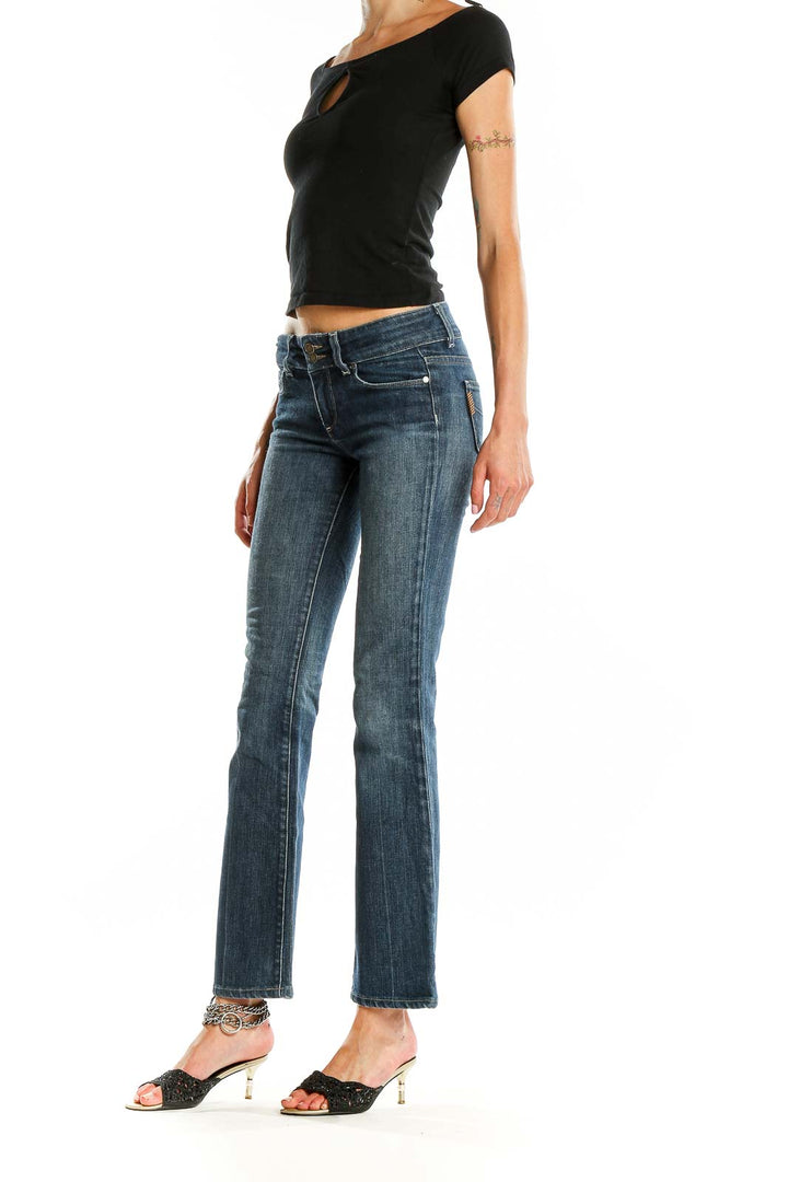 Front view of Paige blue flared denim jeans on model