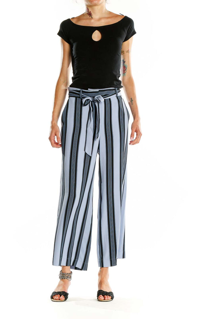 Front view of Ann Taylor LOFT blue striped wide-leg trousers with paper bag waist and self-tie belt