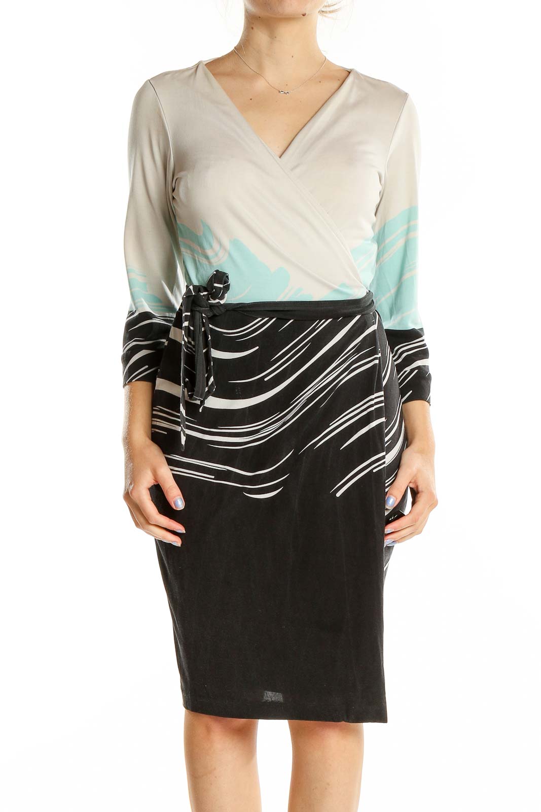 Front view of Diane von Furstenberg beige silk wrap dress with colorblock design