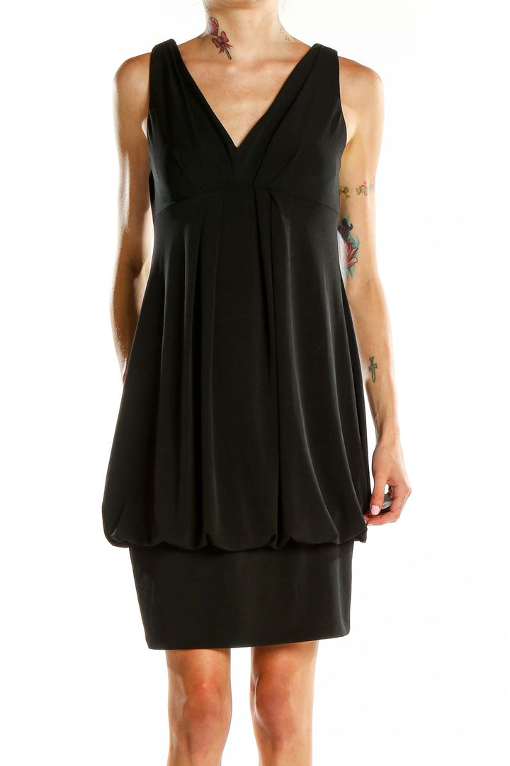 Front view of Eliza J black cocktail dress with V-neck and bubble hem