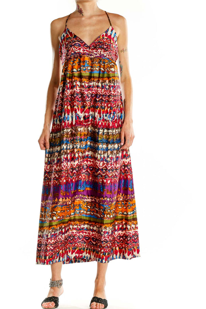 Front view of ECI multicolor bohemian maxi dress with vibrant patterns