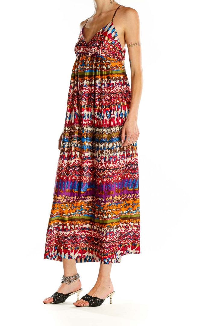 Front view of ECI multicolor bohemian maxi dress with vibrant patterns