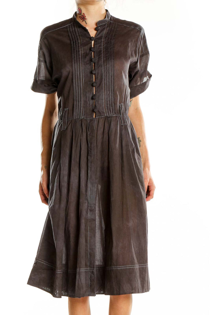 Front view of brown cotton pleated shirt dress from Banana Republic