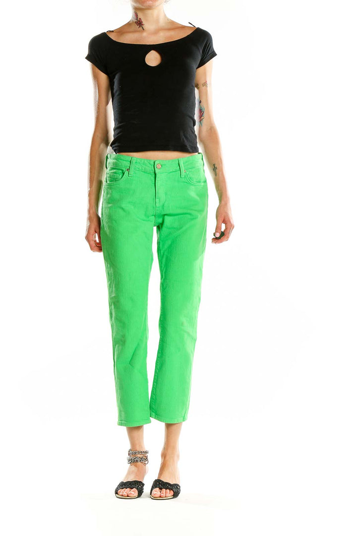 Front view of Kate Spade green cropped denim jeans on model